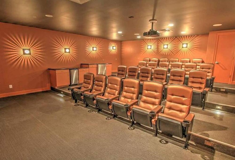 Resort movie theatre with seating at Sapphire Tower, South Padre Island