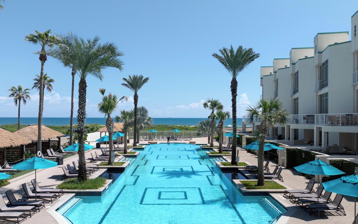 The 100-yard heated beachfront pool at Sapphire Tower, South Padre Island