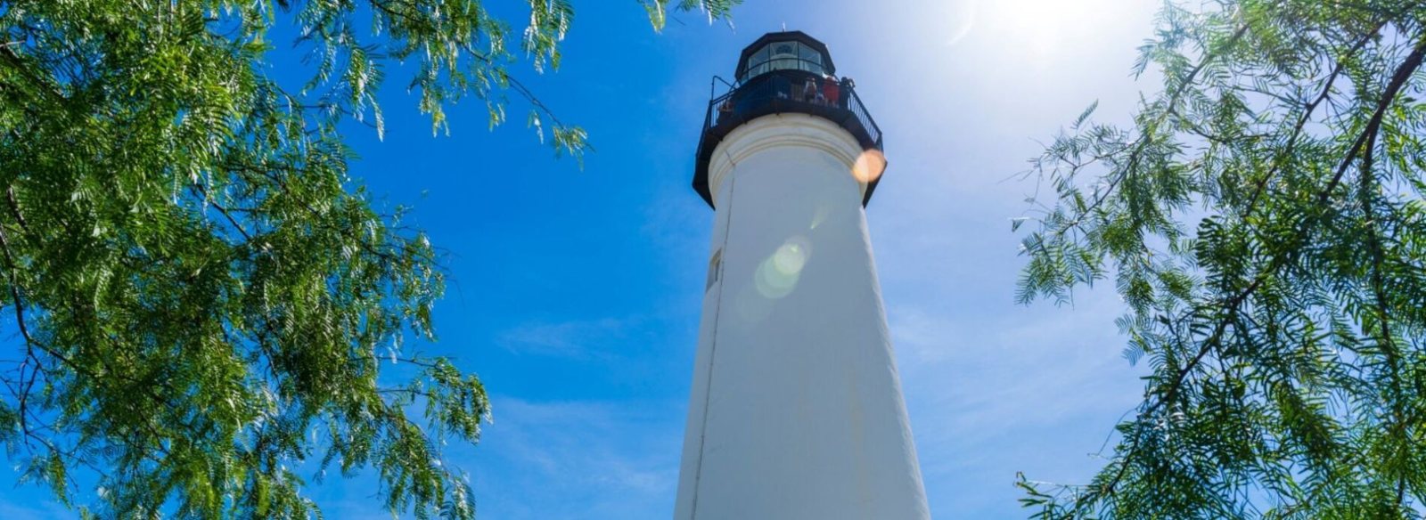 Port Isabel Lighthouse near South Padre Island under a bright blue sky