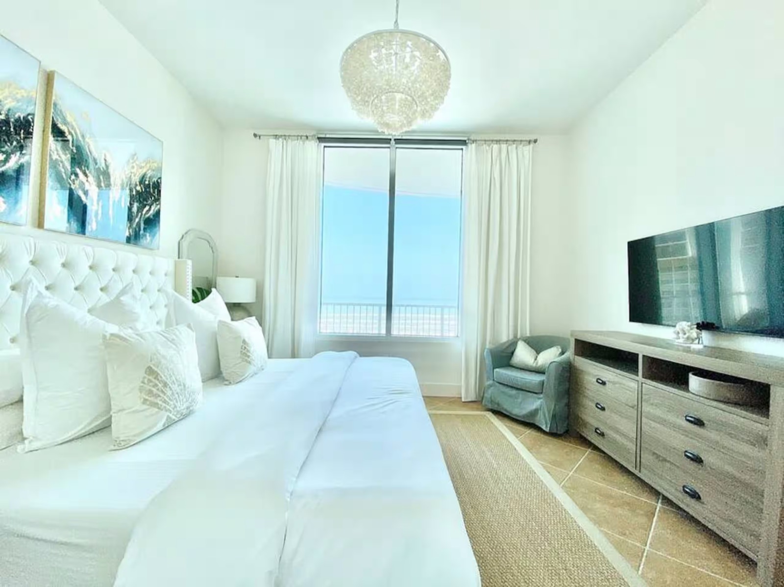 Primary bedroom with king bed and Gulf view at Casa Cova, Sapphire Tower South Padre Island